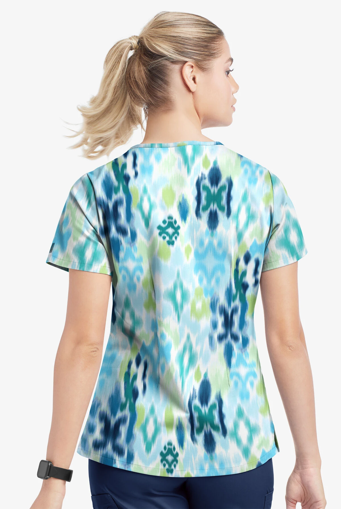 UA Butter-Soft STRETCH Varna Ikat Turquoise Women's 4-Pocket Grommet Printed Scrub Top 5 UA Butter-Soft STRETCH Varna Ikat Turquoise Women's 4-Pocket Grommet Printed Scrub Top - Image 3